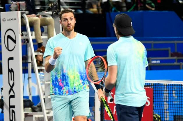 MONTPELLIER, FRANCE - FEBRUARY 4 : Albano OLIVETTI (FRA) and Sam WEISSBORN (AUT) during the doubles final of the ATP, Tennis Herren 250 Open Sud de France tournament vs. Sadio DOUMBIA (FRA) and Fabien REBOUL (FRA) in Montpellier, France on February 4th, 2024. TENNIS : Open Sud de France ATP 250 - 04 02 2024 ValentinaClaret Panoramic 