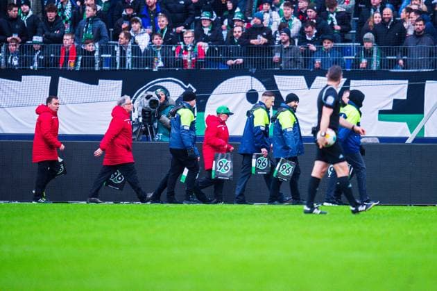 04 02 2024 Football, 2023 2024, 1 Bundesliga, Matchday 20, Hannover 96 FC Hansa Rostock Fans Hannover throw tennis balls in protest against the DFL, German Football League stewards remove them from the sidelines DFL REGULATIONS PROHIBIT ANY USE OF PHOTOGRAPHS AS IMAGE SEQUENCES AND OR QUASI VIDEO