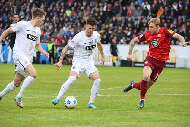 04 02 2024, Football, Men, 2 Bundesliga, Season 2023 2024, SV 07 Elversberg 1 FC Kaiserslautern, Hugo Vandermersch SV 07 Elversberg , Tymoteusz Puchacz 1 FC Kaiserslautern Elversberg Ursapharm Arena an der Kaiserlinde Saarland Germany EN