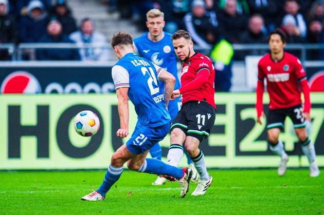 04 02 2024 Soccer, 2023 2024, 1 Bundesliga, Matchday 20, Hannover 96 FC Hansa Rostock L R Alexander Rossipal Rostock , Louis Schaub Hannover DFL REGULATIONS PROHIBIT ANY USE OF PHOTOGRAPHS AS IMAGE SEQUENCES AND OR QUASI VIDEO