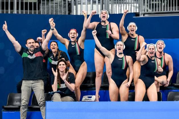 Athletes of Team Italy cheers during the Water polo, Wasserball women match between team Italy (white caps) and team Canada (blue caps) of the 21st World Aquatics Championships at the Aspire Dome in Doha (Qatar), February 8, 2024. GiorgioXScala