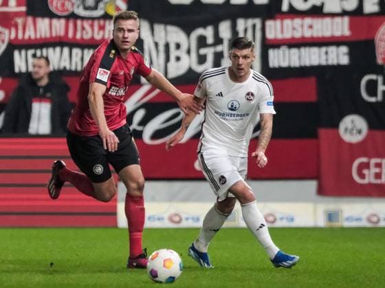 Florian Carstens SV Wehen Wiesbaden, 17 in duel with Erik Wekesser 1 FC Nuernberg, 13 , GER, SV Wehen Wiesbaden vs 1 FC Nuernberg, Soccer, 2 Bundesliga, Matchday 21, Season 2023 2024, 09 02 2024 DFL REGULATES PROHIBIT ANY USE OF PHOTOGRAPHS AS IMAGE SEQUENCES AND OR QUASI VIDEO GER, SV Wehen Wiesbaden vs 1 FC Nuernberg, Football, 2 Bundesliga, Matchday 21, Season 2023 2024, 09 02 2024 Wiesbaden Copyright: xEibner-Pressefoto FlorianxWieganx EP_FWD