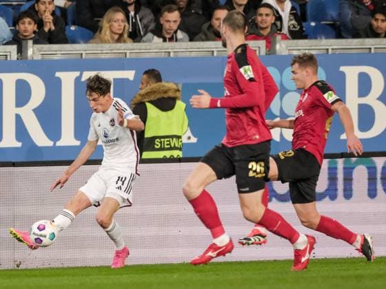 Benjamin Goller 1 FC Nuernberg, 14 on the ball, GER, SV Wehen Wiesbaden vs 1 FC Nuernberg, Football, 2 Bundesliga, Matchday 21, Season 2023 2024, 09 02 2024 DFL REGULATIONS PROHIBIT ANY USE OF PHOTOGRAPHS AS IMAGE SEQUENCES AND OR QUASI VIDEO GER, SV Wehen Wiesbaden vs 1 FC Nuernberg, Football, 2 Bundesliga, Matchday 21, Season 2023 2024, 09 02 2024 Wiesbaden Copyright: xEibner-Pressefoto FlorianxWieganx EP_FWD