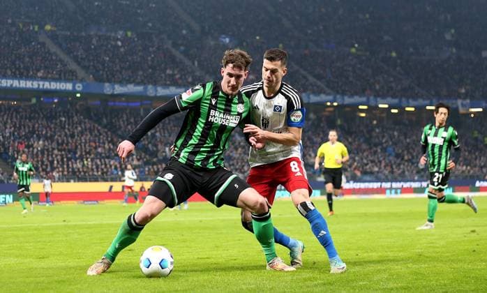 09 02 2024, Soccer 2 Bundesliga 2023 2024, Matchday 21, Hamburger SV Hannover 96 , at Volksparkstadion Hamburg L R Phil Yannik Neumann Hannover vs Laszlo Benes Hamburg DFL and DFB regulations prohibit any use of photographs as image sequences and or quasi video