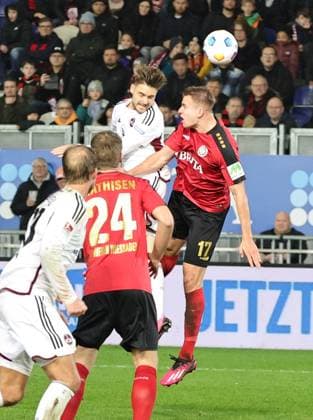 09 02 2024 Soccer Season 2023 2024 2 Soccer Bundesliga 21 Matchday SV Wehen Wiesbaden 1 FC Nürnberg FCN Club Sportfoto Zink DaMa xdaxmax DFL regulations prohibit any use of photographs as image sequences and or quasi video only for editorial use Lukas Schleimer 36, 1 FC Nürnberg FCN with header gg Florian Carstens 17, SV Wehen 1926 Wiesbaden SVWW