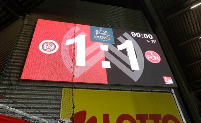 09 02 2024 Soccer Season 2023 2024 2 Soccer Bundesliga 21 Matchday SV Wehen Wiesbaden 1 FC Nürnberg FCN Club Sportfoto Zink DaMa xdaxmax DFL regulations prohibit any use of photographs as image sequences and or quasi video only for editorial use Symbolbild Symbol photo Feature Impression Scoreboard with final score 1 1