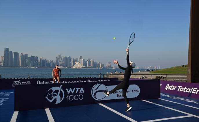 Qatar TotalEnergies Open 2024 Iga Swiatek POL and Marketa Vondrousova CZE at the Photostand at Mia Park Doha