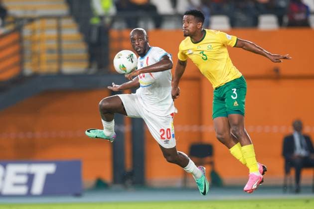 ABIDJAN, COTE D IVOIRE - FEBRUARY 10; Yoane Wissa of Congo Dr and Terrence Mashego of South Africa during the TotalEnergies Caf Africa Cup of Nations (Afcon 2023) Third Place match between South Africa and Congo Dr at Stade Felix Houphouet-Boigny on February 10, 2024 in Abidjan, Cote d Ivore. Photo by Didier Lefa Copyright: xx