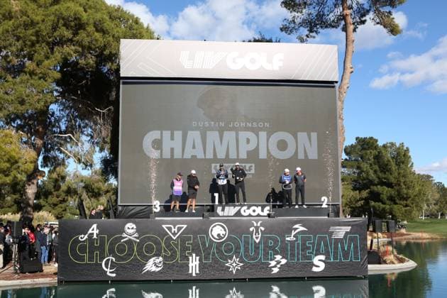 LAS VEGAS, NV - FEBRUARY 10: Dustin Johnson captain of 4Aces GC takes to the podium to celebrate after winning the LIV Golf League tournament with Taylor Gooch of Smash GC and Peter Uihlein of Rangegoats GC tied at eleven under on February 10, 2024 at the Las Vegas Country Club in Las Vegas, NV. (Photo by Matthew Bolt Icon Sportswire) GOLF: FEB 10 LIV Golf League Las Vegas EDITORIAL USE ONLY Icon240210194871