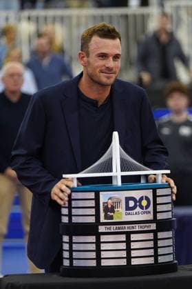 February 11, 2024, Dallas, Texas, USA: Dallas, Texas, USA: American tennis player Tommy Paul wears the blue jacket as winner of the tournament and poses with the Lamar Hunt Trophy after winning the championship game of the Dallas Open at the Styslinger ALTEC Tennis Center on the campus of Southern Methodist University on Sunday February 11, 2024. Dallas USA - ZUMAv131 20240211_znp_v131_013 Copyright: xJavierxVicenciox