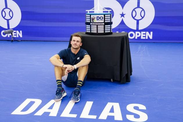 DALLAS, TX - FEBRUARY 11: Tommy Paul (USA) poses with the trophy after winning the Dallas Open on February 11, 2024 at Styslinger Altec Tennis Complex in Dallas, TX. (Photo by George Walker Icon Sportswire) TENNIS: FEB 11 Dallas Open EDITORIAL USE ONLY Icon24021121