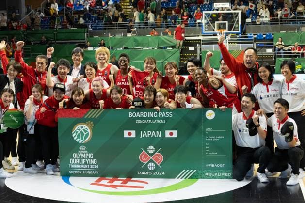 (240212) -- SOPRON, Feb. 12, 2024 -- Members of team Japan react to winning the match between Canada and Japan and getting the ticket to the Paris Olympic Games, Olympische Spiele, Olympia, OS at the FIBA Women s Olympic qualifying tournament in Sopron, Hungary on Feb. 11, 2024. (Photo by Xinhua) (SP) HUNGARY-SOPRON-BASKETBALL-FIBA WOMEN S OLYMPIC QUALIFIERS-CANADA VS JAPAN AttilaxVolgyi 