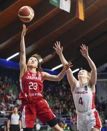 Basketball: Olympic women s qualifier Japan s Mai Yamamoto (23) scores during the third quarter of an Olympic women s basketball qualifier against Canada on Feb. 11, 2024, in Sopron, Hungary.  A14AA0002454531P