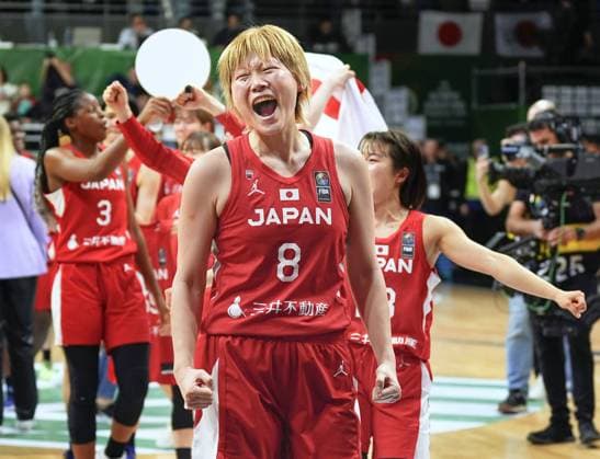 Basketball: Olympic women s qualifier Japan s Maki Takada celebrates after her team secured a spot in the 2024 Paris Olympic women s basketball tournament by defeating Canada in a qualifier on Feb. 11, 2024, in Sopron, Hungary.  A14AA0002454635P