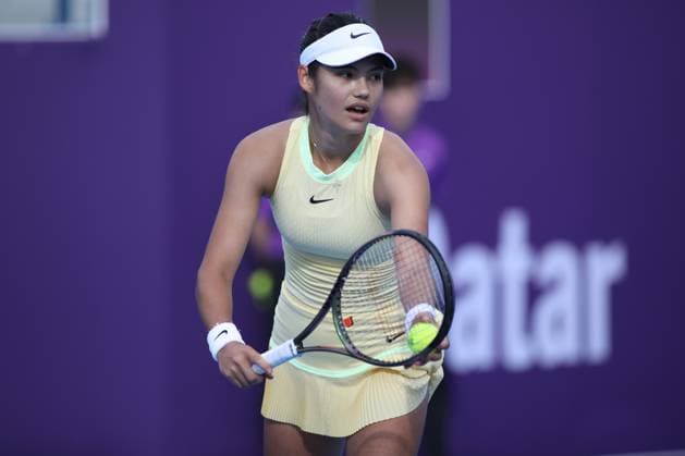 DOHA, QATAR - FEBRUARY 12: Emma Raducanu of Great Britain in action against Anhelina Kalinina of Ukraine in the first round on Day 2 during the Qatar TotalEnergies Open, part of the Hologic WTA, Tennis Damen Tour at Khalifa International Tennis and Squash Complex on February 12, 2024 in Doha, Qatar  Copyright: xx