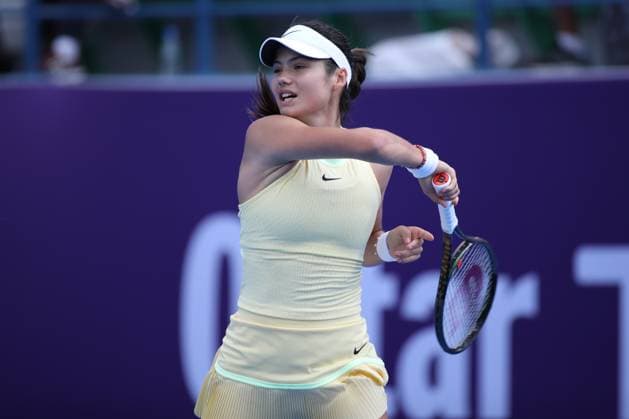 DOHA, QATAR - FEBRUARY 12: Emma Raducanu of Great Britain in action against Anhelina Kalinina of Ukraine in the first round on Day 2 during the Qatar TotalEnergies Open, part of the Hologic WTA, Tennis Damen Tour at Khalifa International Tennis and Squash Complex on February 12, 2024 in Doha, Qatar  Copyright: xx