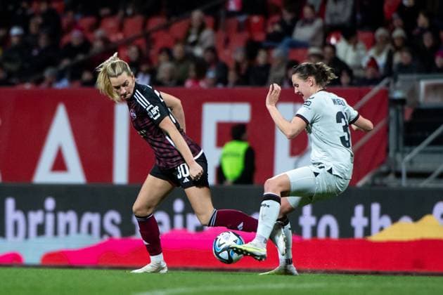 Medina Desic FC Nuernberg, 30 in duel with Verena Wieder Bayer 04 Leverkusen, 31 , GER, FC Nuernberg vs Bayer 04 Leverkusen, Football Google Pixel Women Bundesliga, Matchday 13, Season 2023 2024, 12 02 2024 DFB regulations prohibit any use of photographs as image sequences and or quasi video GER, FC Nuernberg vs Bayer 04 Leverkusen, Football Google Pixel Women Bundesliga, Matchday 13, Season 2023 2024, 12 02 2024 Nuernberg Copyright: xEibner-Pressefoto Memmlerx EP_MMR