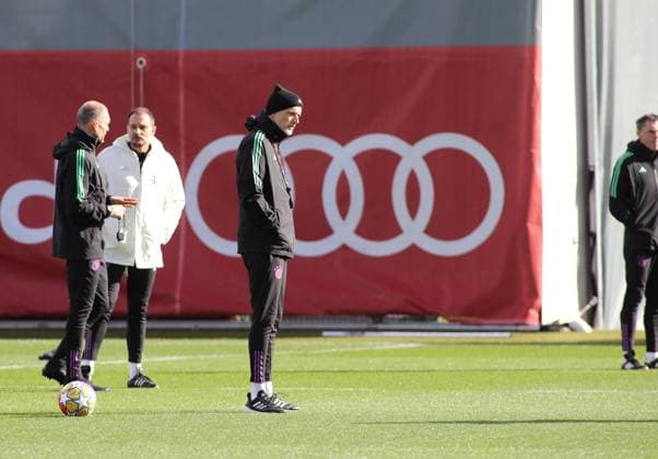 Munich, Germany February 13, 2024 Football, Men, Season 2023 2024, FC Bayern Munich, Säbener Strasse, Training ground, Final training, Champions League Thomas Tuchel, Coach FC Bayern Munich stands on the pitch and watches the training, sideways, in profile