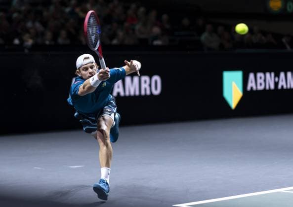 ROTTERDAM - Zizou Bergs of Belgium in action against Andrey Rublev of Russia during the second day of the ABN AMRO Open tennis tournament in Ahoy. ANP SANDER KONING ABN AMRO Open 2024 xVIxANPxSportx xxANPxIVx 491041251 originalFilename: 491041251.jpg