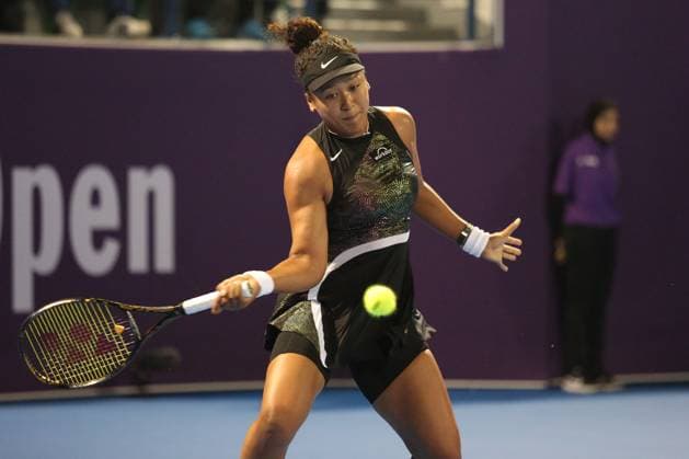 DOHA, QATAR - FEBRUARY 13: Naomi Osaka of Japan plays against Petra Martic in their second round match during the Qatar TotalEnergies Open, part of the Hologic WTA, Tennis Damen Tour at Khalifa International Tennis and Squash Complex on February 13, 2024 in Doha, Qatar  Copyright: xx
