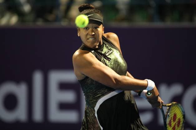 DOHA, QATAR - FEBRUARY 13: Naomi Osaka of Japan plays against Petra Martic in their second round match during the Qatar TotalEnergies Open, part of the Hologic WTA, Tennis Damen Tour at Khalifa International Tennis and Squash Complex on February 13, 2024 in Doha, Qatar  Copyright: xx