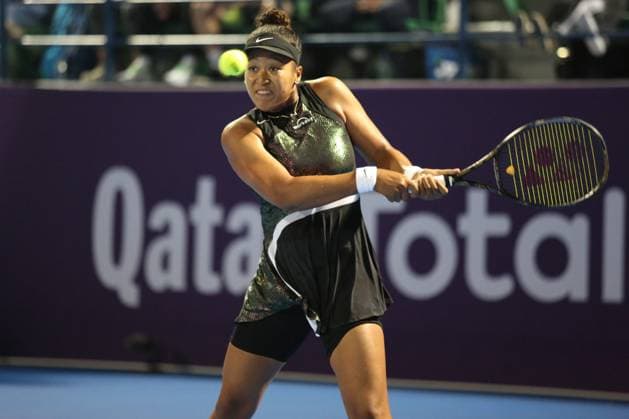 DOHA, QATAR - FEBRUARY 13: Naomi Osaka of Japan plays against Petra Martic in their second round match during the Qatar TotalEnergies Open, part of the Hologic WTA, Tennis Damen Tour at Khalifa International Tennis and Squash Complex on February 13, 2024 in Doha, Qatar  Copyright: xx