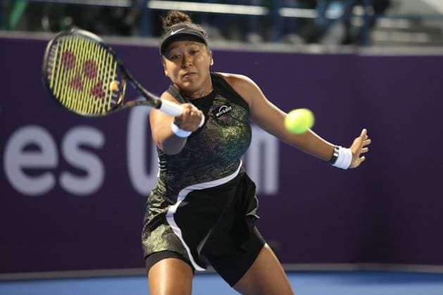 DOHA, QATAR - FEBRUARY 13: Naomi Osaka of Japan plays against Petra Martic in their second round match during the Qatar TotalEnergies Open, part of the Hologic WTA, Tennis Damen Tour at Khalifa International Tennis and Squash Complex on February 13, 2024 in Doha, Qatar  Copyright: xx