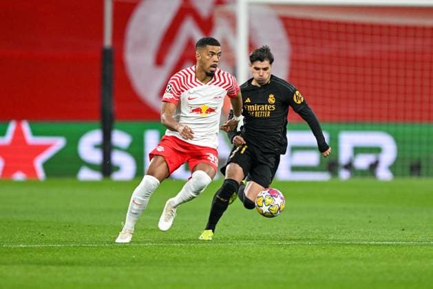 Champions League RB Leipzig Real Madrid on 13 02 2023 at the Red Bull Arena in Leipzig Benjamin Henrichs RB Leipzig in a duel against Brahim Diaz Real Madrid MT