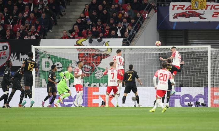 13 02 2024, xtgx, Football UEFA Champions League 1 8 Final, RB Leipzig Real Madrid emspor, v l Benjamin Henrichs RB Leipzig on header DFL DFB REGULATIONS PROHIBIT ANY USE OF PHOTOGRAPHS as IMAGE SEQUENCES and or QUASI VIDEO Leipzig