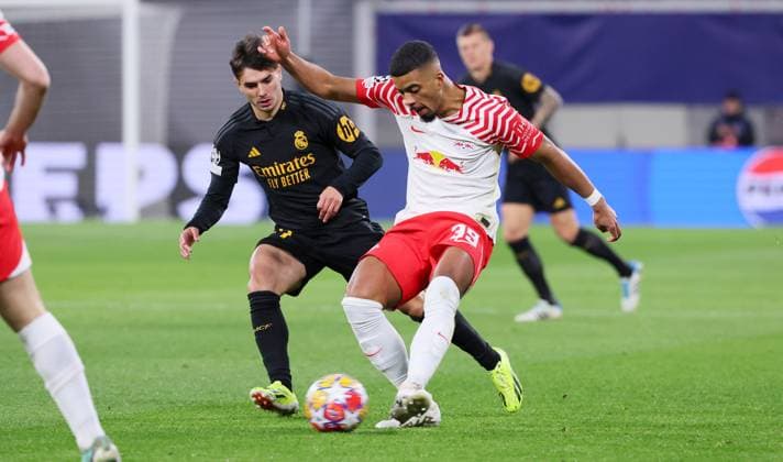 RB Leipzig Real Madrid Champions League Leipzig, 13 02 2024, Red Bull Arena, Football, UEFA Champions League, Round of 16 , RB Leipzig vs Real Madrid , Pictured from left Brahim Diaz 21, Real , Benjamin Henrichs 39, RB Leipzig , Only editorial use , UEFA regulations prohibit any use of photographs as image sequences and or quasi video ,