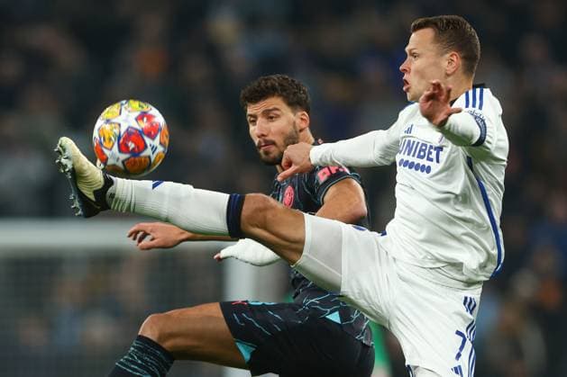 Ruben Dias of Manchester City battles with Viktor Claesson of F.C. Copenhagen FC Copenhagen v Manchester City, UEFA Champions League, Round of 16, First Leg, Football, Parken Stadium, Copenhagen, Denmark - 13 Feb 2024 EDITORIAL USE ONLY No use with unauthorised audio, video, data, fixture lists, club league logos or live services. Online in-match use limited to 120 images, no video emulation. No use in betting, games or single club league player publications. Copyright: xKieranxMcManus Shutterstockx 14343227ah