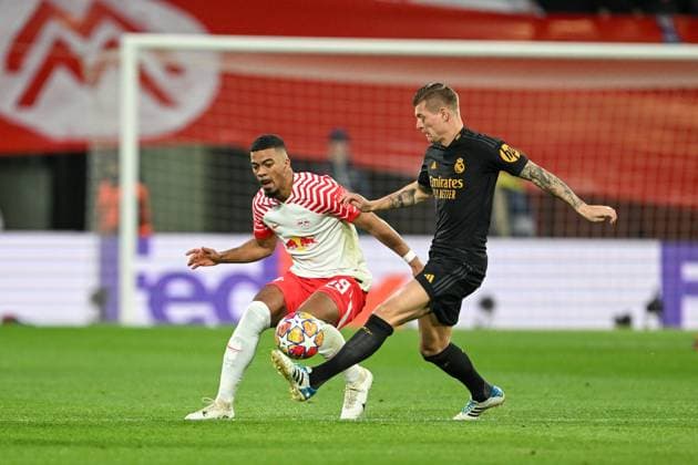 Champions League RB Leipzig Real Madrid on 13 02 2023 at the Red Bull Arena in Leipzig Benjamin Henrichs RB Leipzig in a duel against Toni Kroos Real Madrid MT