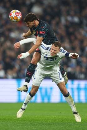 Viktor Claesson of F.C. Copenhagen battles with Ruben Dias of Manchester City FC Copenhagen v Manchester City, UEFA Champions League, Round of 16, First Leg, Football, Parken Stadium, Copenhagen, Denmark - 13 Feb 2024 EDITORIAL USE ONLY No use with unauthorised audio, video, data, fixture lists, club league logos or live services. Online in-match use limited to 120 images, no video emulation. No use in betting, games or single club league player publications. Copyright: xKieranxMcManus Shutterstockx 14343227bd