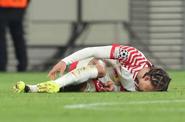 13 02 2024, xtgx, Football UEFA Champions League 1 8 Final, RB Leipzig Real Madrid emspor, v l Xavi Simons RB Leipzig on the ground DFL DFB REGULATIONS PROHIBIT ANY USE OF PHOTOGRAPHS as IMAGE SEQUENCES and or QUASI VIDEO Leipzig