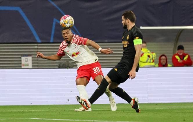RB Leipzig Real Madrid Champions League Leipzig, 13 02 2024, Red Bull Arena, Champions League, Round of 16 , RB Leipzig vs Real Madrid , In the picture from l Benjamin Henrichs 39, RB Leipzig and Nacho Fernandez 6, Real , Picture Point