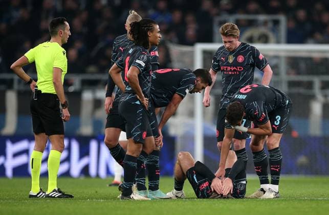 13 02 2024, Football UEFA Champions League 2023 2024, Round of 16, FC Copenhagen Manchester City , at Parken Stadion Copenhagen Jack Grealish Manchester City lies injured on the ground DFL and DFB regulations prohibit any use of photographs as image sequences and or quasi video