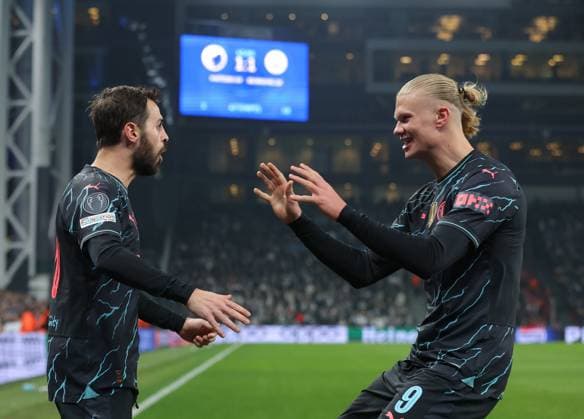 Copenhagen, Denmark, 13th February 2024. Bernardo Silva (L) of Manchester City celebrates with Erling Haaland after scoring to make it 2-1 during the UEFA Champions League match at Telia Parken, Copenhagen. Picture credit should read: Paul Terry Sportimage EDITORIAL USE ONLY. No use with unauthorised audio, video, data, fixture lists, club league logos or live services. Online in-match use limited to 120 images, no video emulation. No use in betting, games or single club league player publications. SPI-2935-0028