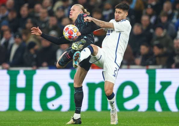 Erling Haaland of Manchester City battles with Kevin Diks of F.C. Copenhagen FC Copenhagen v Manchester City, UEFA Champions League, Round of 16, First Leg, Football, Parken Stadium, Copenhagen, Denmark - 13 Feb 2024 EDITORIAL USE ONLY No use with unauthorised audio, video, data, fixture lists, club league logos or live services. Online in-match use limited to 120 images, no video emulation. No use in betting, games or single club league player publications. Copyright: xKieranxMcManus Shutterstockx 14343227bx