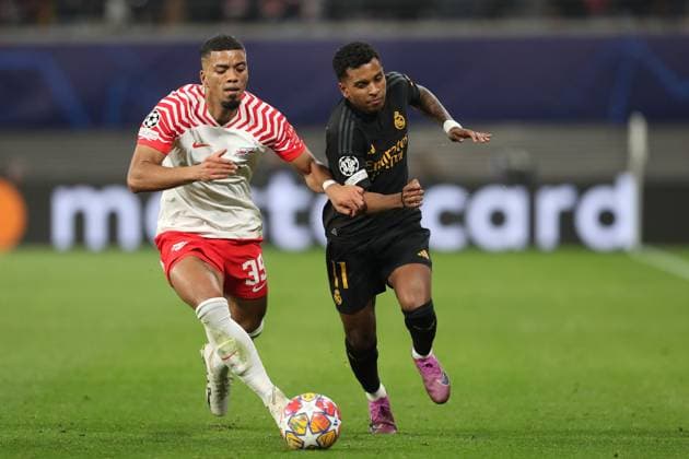 13 02 2024, xtgx, Football UEFA Champions League 1 8 Final, RB Leipzig Real Madrid emspor, v l Benjamin Henrichs RB Leipzig , Rodrygo Real Madrid DFL DFB REGULATIONS PROHIBIT ANY USE OF PHOTOGRAPHS as IMAGE SEQUENCES and or QUASI VIDEO Leipzig
