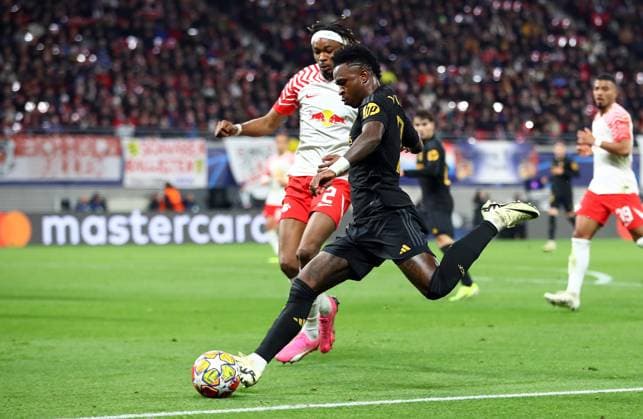 13 02 2024, xtgx, Football UEFA Champions League 1 8 Final, RB Leipzig Real Madrid emspor, v l Mohamed Simakan RB Leipzig , Vinicius Junior Real Madrid DFL DFB REGULATIONS PROHIBIT ANY USE OF PHOTOGRAPHS as IMAGE SEQUENCES and or QUASI VIDEO Leipzig