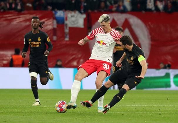 13 02 2024, xgox, Football UEFA Champions League 1 8 Final, RB Leipzig Real Madrid emspor, v l Benjamin Sesko RB Leipzig , Nacho Real Madrid DFL DFB REGULATIONS PROHIBIT ANY USE OF PHOTOGRAPHS as IMAGE SEQUENCES and or QUASI VIDEO Leipzig