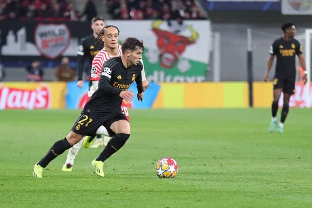 Champions League, Round of 16 RB Leipzig vs Real Madrid, 13 02 24 Brahim Diaz 21, Real Madrid ahead of Xavi Simons 20, RB Leipzig Football, UEFA Champions League, Season 2023 2024, Round of 16 RB Leipzig vs Real Madrid on 13 02 24 at the Red Bull Arena, Leipzig Copyright: xBEAUTIFULxSPORTS JanxKaeferx