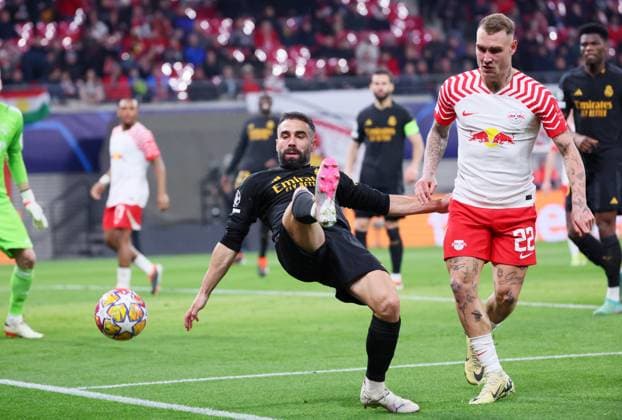 RB Leipzig Real Madrid Champions League Leipzig, 13 02 2024, Red Bull Arena, Football, UEFA Champions League, Round of 16 , RB Leipzig vs Real Madrid , Pictured from left Daniel Carvajal 2, Real , David Raum 22, RB Leipzig , Only editorial use , UEFA regulations prohibit any use of photographs as image sequences and or quasi video ,