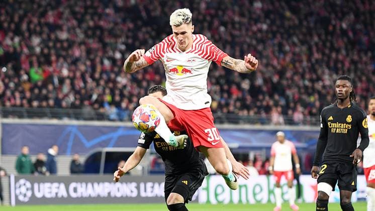 Soccer UEFA Champions League, season 2023 2024, round of 16, first leg, RB Leipzig vs Real Madrid 13 02 2024 Benjamin Sesko center forward RB Leipzig, back number 30, 30 on the ball in front of the Madrid goal at the match RB Leipzig vs Real Madrid 13 02 2024 Leipzig Saxony Germany Red Bull Arena