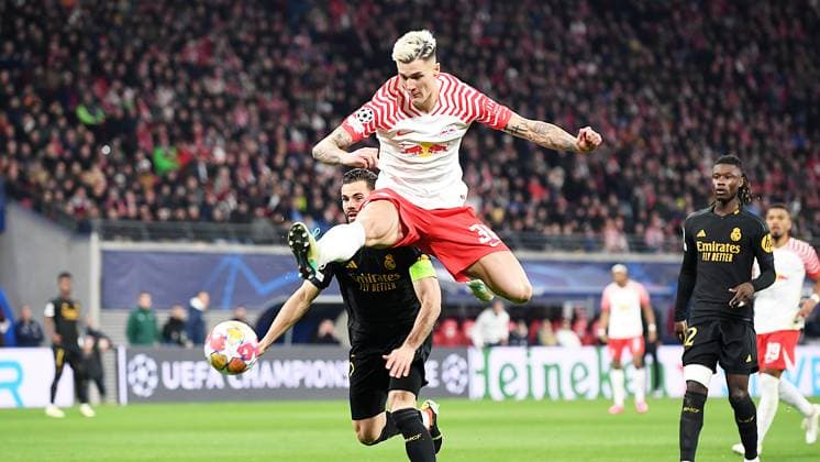 Soccer UEFA Champions League, season 2023 2024, round of 16, first leg, RB Leipzig vs Real Madrid 13 02 2024 Benjamin Sesko center forward RB Leipzig, back number 30, 30 on the ball in front of the Madrid goal at the match RB Leipzig vs Real Madrid 13 02 2024 Leipzig Saxony Germany Red Bull Arena