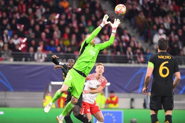 Sport Bilder des Tages Leipzig, GERMANY - 13.02.24: Andriy Lunin, The match of match UEFA Champion League RB Leipzig vs Real Madrid at Red Bull Arena  Copyright: xVITALIIxKLIUIEVx