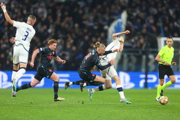 Erling Haaland of Manchester City is fouled by Oscar Hojlund of F.C. Copenhagen FC Copenhagen v Manchester City, UEFA Champions League, Round of 16, First Leg, Football, Parken Stadium, Copenhagen, Denmark - 13 Feb 2024 EDITORIAL USE ONLY No use with unauthorised audio, video, data, fixture lists, club league logos or live services. Online in-match use limited to 120 images, no video emulation. No use in betting, games or single club league player publications. Copyright: xKieranxMcManus Shutterstockx 14343227ci