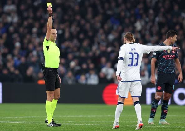 Copenhagen, Denmark, 13th February 2024. Rasmus Falk of FC Copenhagen is shown a yellow card during the UEFA Champions League match at Telia Parken, Copenhagen. Picture credit should read: Paul Terry Sportimage EDITORIAL USE ONLY. No use with unauthorised audio, video, data, fixture lists, club league logos or live services. Online in-match use limited to 120 images, no video emulation. No use in betting, games or single club league player publications. SPI-2935-0035
