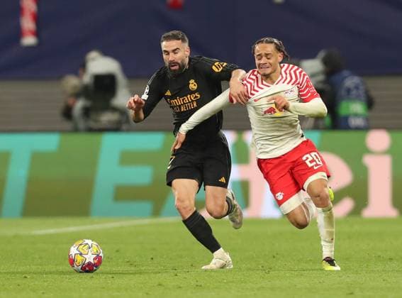 13 02 2024, xtgx, Football UEFA Champions League 1 8 Final, RB Leipzig Real Madrid emspor, v l Daniel Carvajal Real Madrid , Xavi Simons RB Leipzig Gelbe Karte fuer, receive a yellow card DFL DFB REGULATIONS PROHIBIT ANY USE OF PHOTOGRAPHS as IMAGE SEQUENCES and or QUASI VIDEO Leipzig