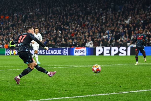 Phil Foden of Manchester City scores for their side to make it 3-1 FC Copenhagen v Manchester City, UEFA Champions League, Round of 16, First Leg, Football, Parken Stadium, Copenhagen, Denmark - 13 Feb 2024 EDITORIAL USE ONLY No use with unauthorised audio, video, data, fixture lists, club league logos or live services. Online in-match use limited to 120 images, no video emulation. No use in betting, games or single club league player publications. Copyright: xKieranxMcManus Shutterstockx 14343227cu